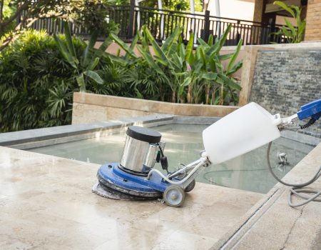 Close up blue polishing machine on the stone floor